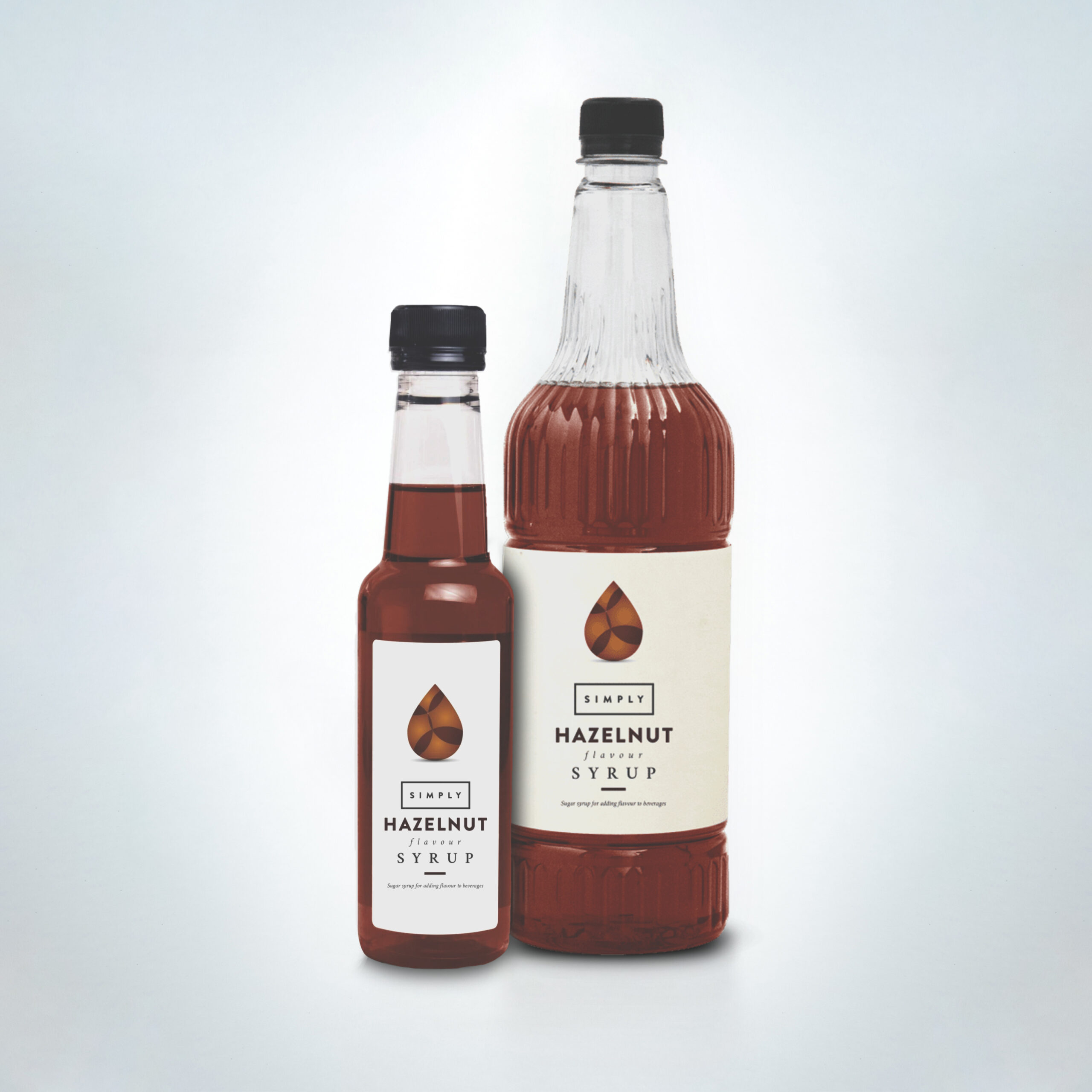 Simply Hazelnut Syrup duo in premium bottles. A smooth and nutty syrup, perfect for flavouring lattes, mochas, and hot chocolates in cafés, coffee shops, and hospitality venues