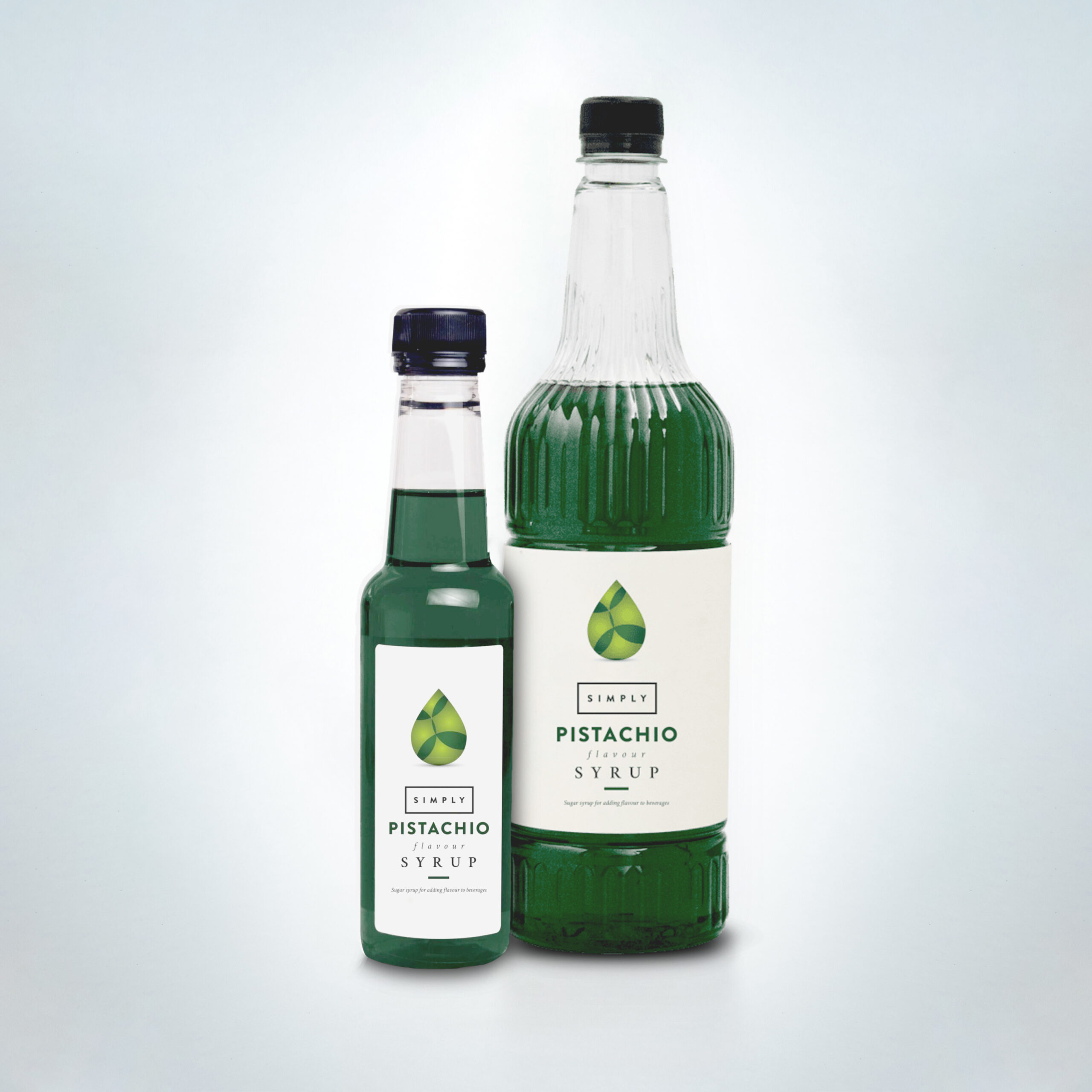 Simply Pistachio Syrup duo in elegant bottles. A smooth, nutty syrup with classic pistachio flavour—perfect for lattes, hot chocolates, and dessert drinks in cafés, coffee shops, and hospitality venues