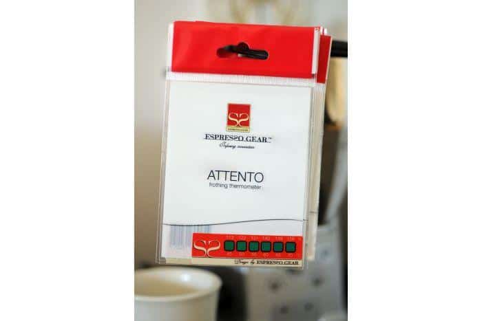 Espresso Gear Attento Frothing Thermometer—adhesive strip-style temperature indicator for milk jugs, helping baristas achieve optimal milk steaming temperatures for lattes and cappuccinos; easy to apply and read.
