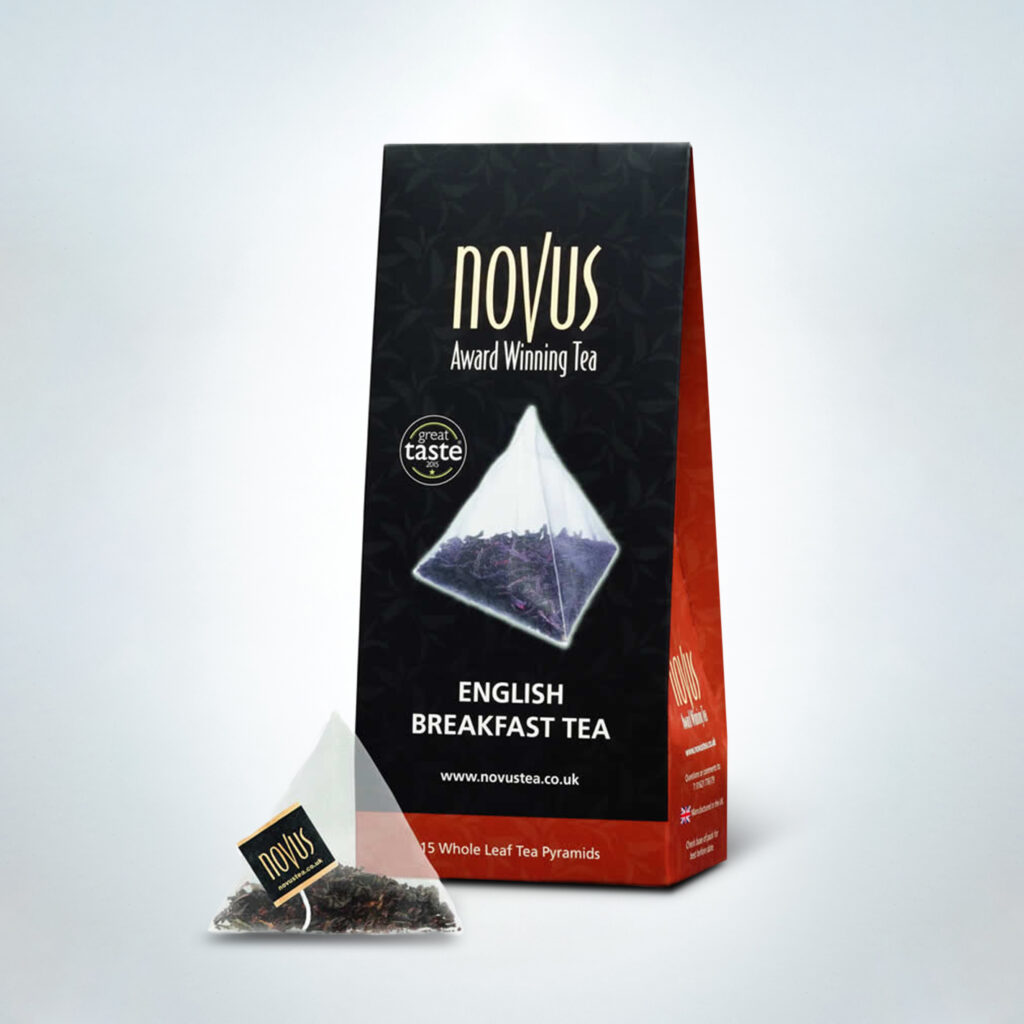 Novus English Breakfast tea in premium packaging with pyramid tea bags. A bold and full-bodied black tea blend, perfect for hotel breakfast service, cafés, and traditional afternoon tea offerings
