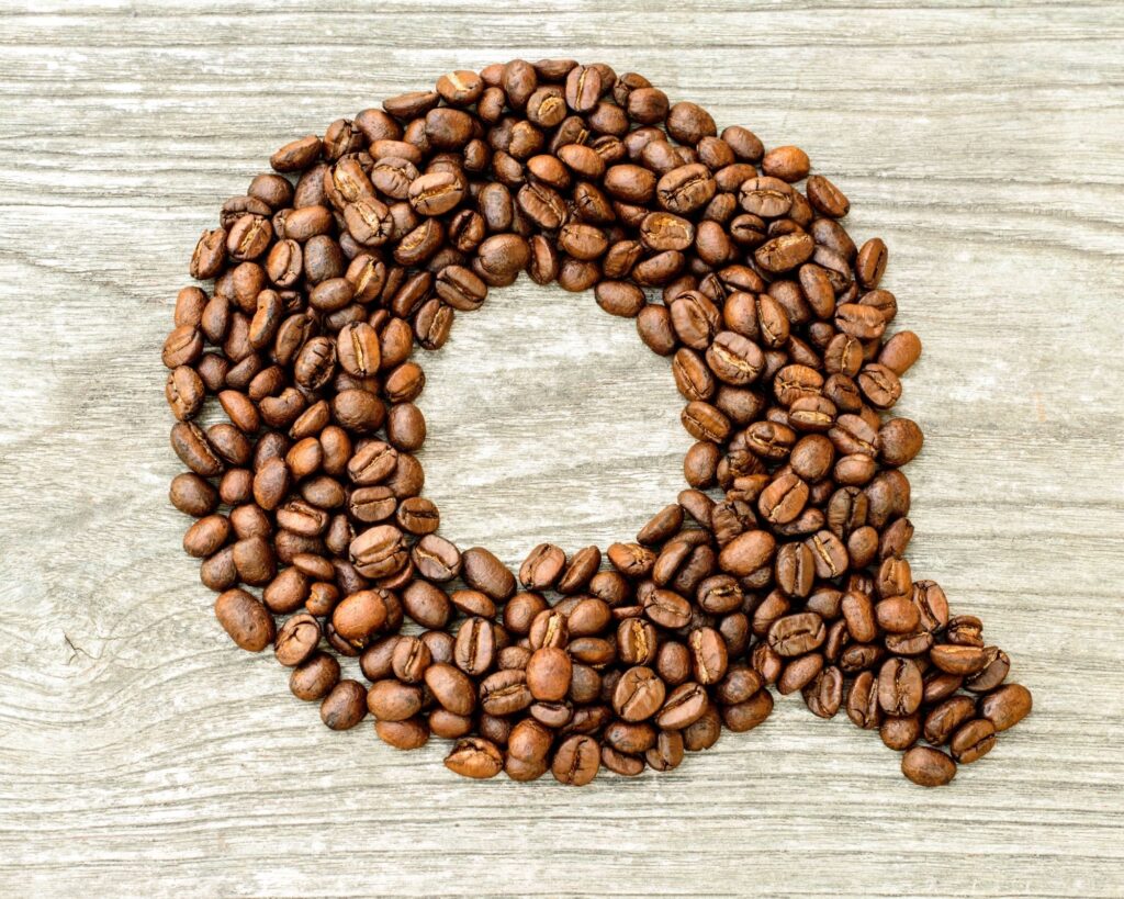 Coffee Q grading process in action, where coffee beans are carefully evaluated for quality, flavor, and aroma to ensure premium coffee standards