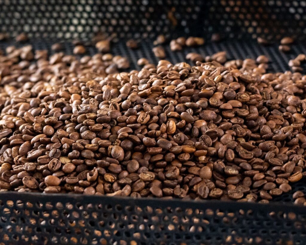 Blown air used in coffee brewing or processing, showcasing the technique for enhancing flavor and aroma in freshly brewed coffee