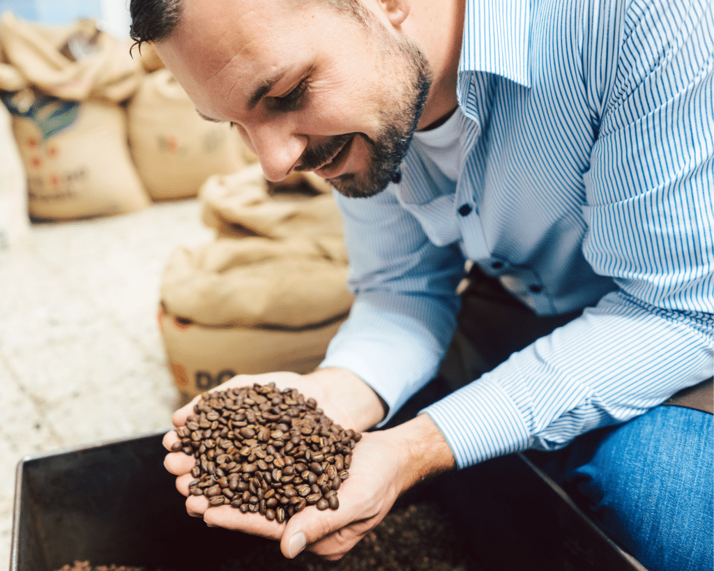 coffee roasters blog images - man with beans