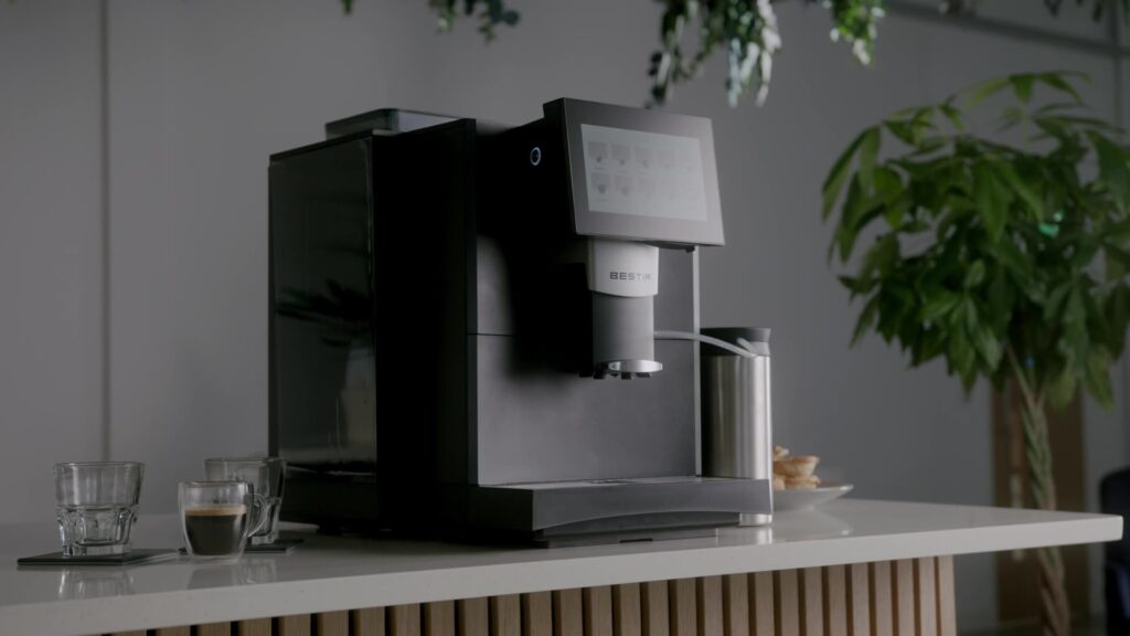 Bestir coffee machine (BM30/40) on a modern countertop with touchscreen display and fresh milk system — a sleek model from the Bestir coffee machines range.