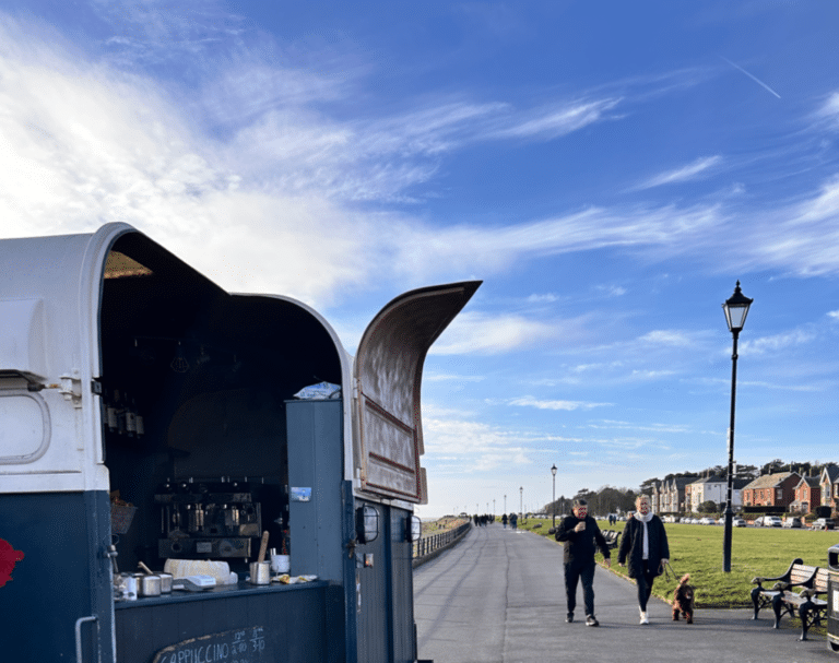 Chuck’s Wagon coffee trailer on a scenic coastal path and Lytham St Anne's, serving Mini & Mighty Coffee to passersby — a local favourite for quality coffee on the go.