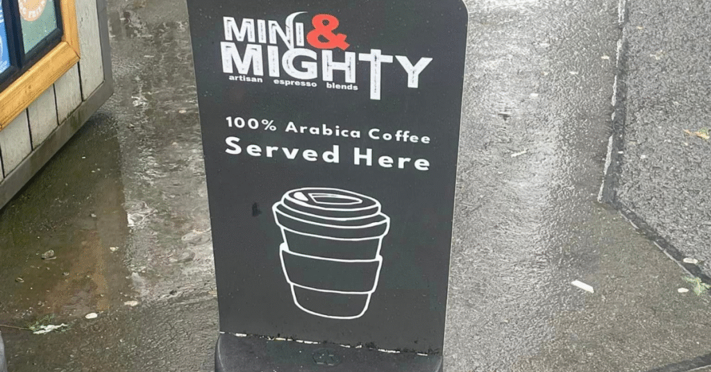 Mini & Mighty pavement sign